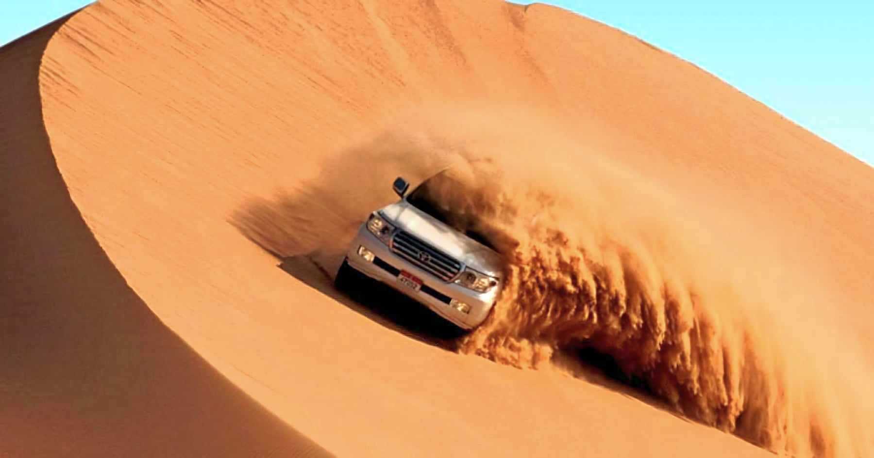 Abu Dhabi Sandboarding und Kameritt, Wüstentour am Morgen, shadows camels on the sand dubai