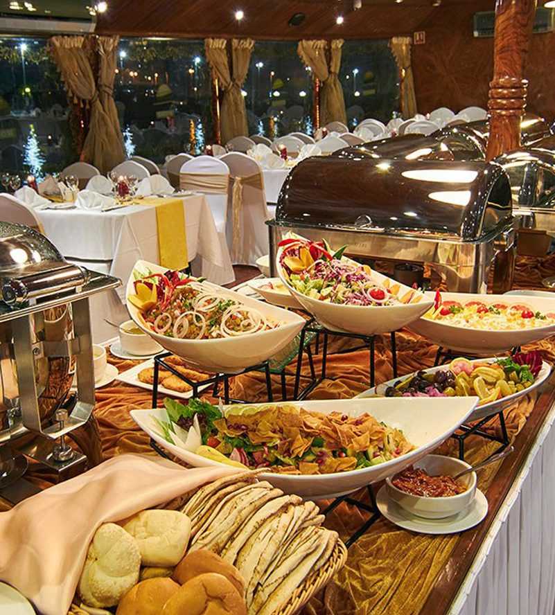 A buffet table filled with a variety of delicious food options-Cruise Dubai