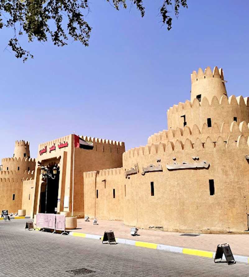 A man kindly offers food to a woman and another man oase Al Ain() copy