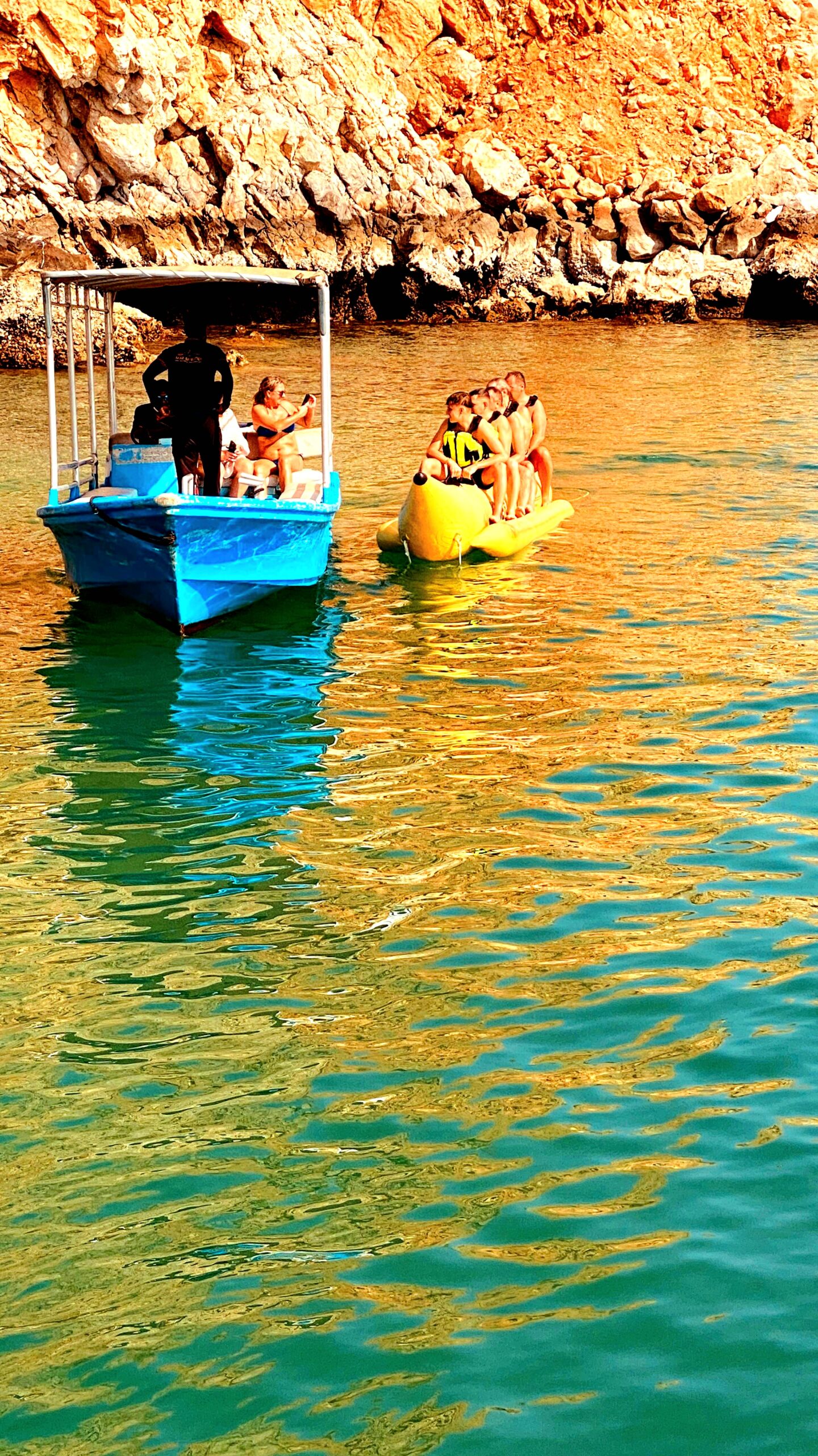 Fun and excitement during a banana boat ride on a yellow inflatable boat