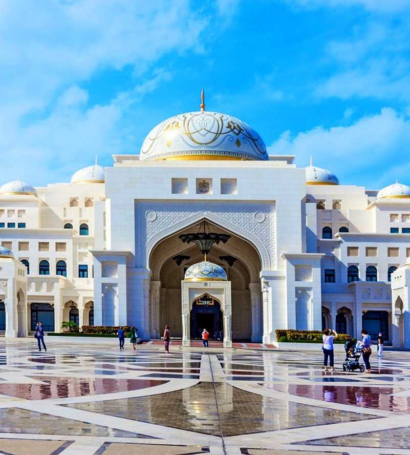 People posing for photo in front of Emirates Palace copy