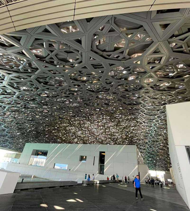 Spacious museum interior with high ceiling showcasing exquisite exhibits
