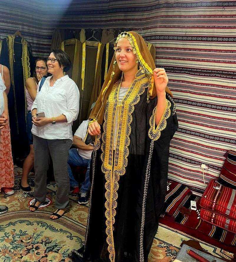 a person in a black robe-Abu Dhabi