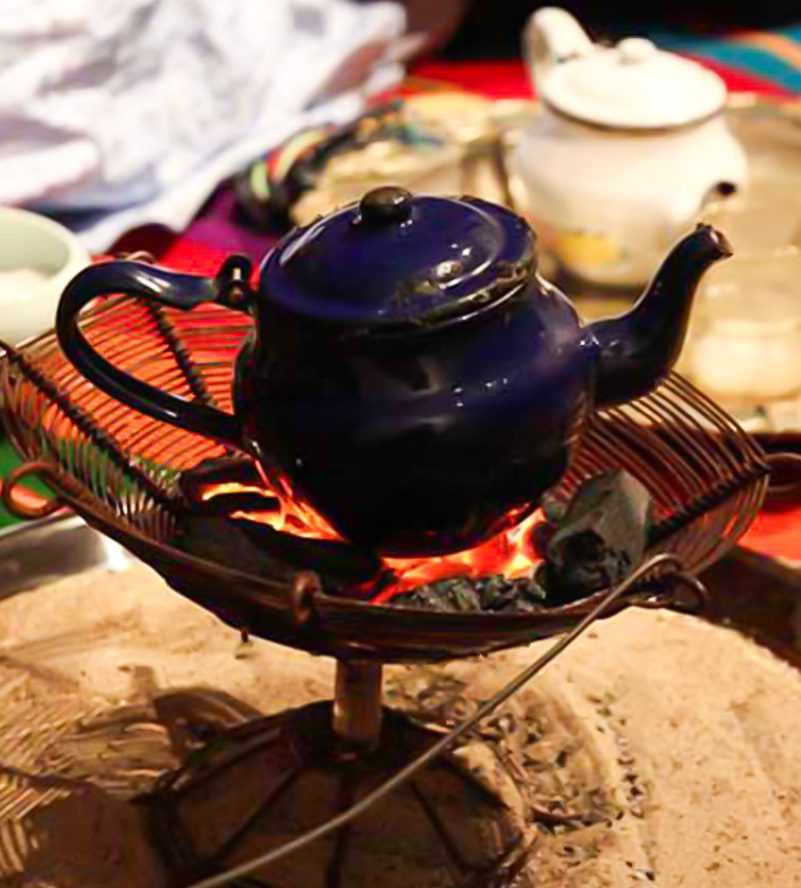 a woman riding an ATV in the Dubai desert