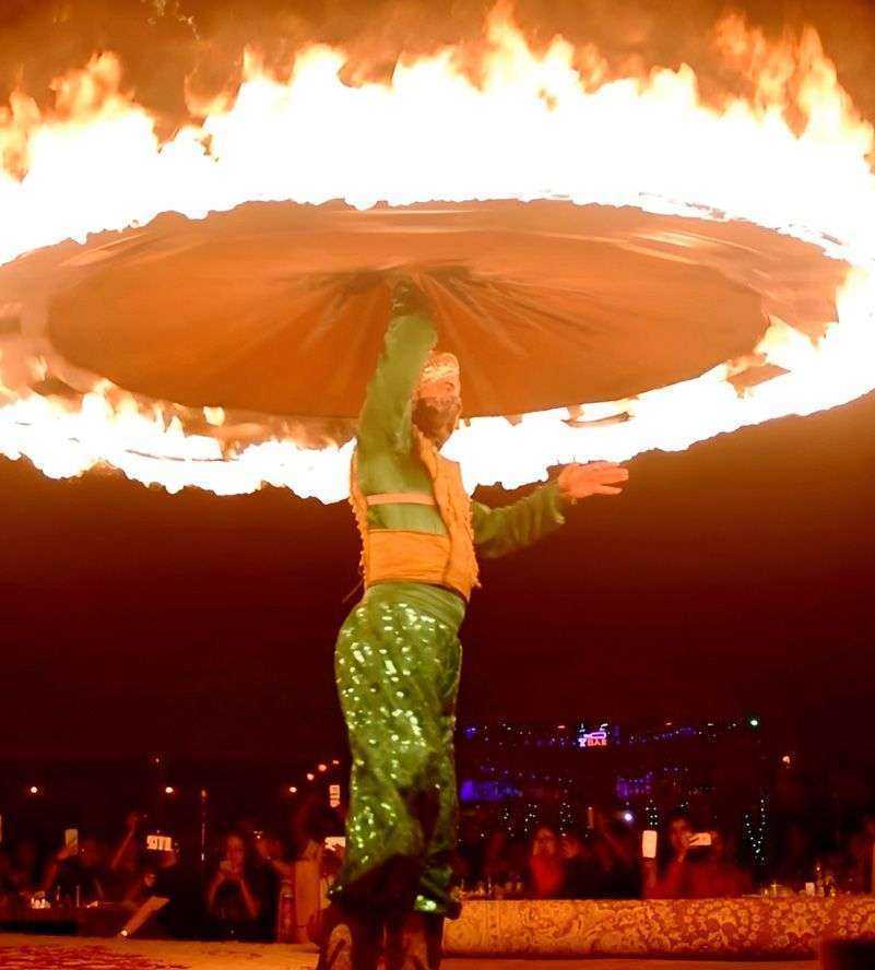 garment holding a large circle of fire n Abu Dhabi United Arab Emirates