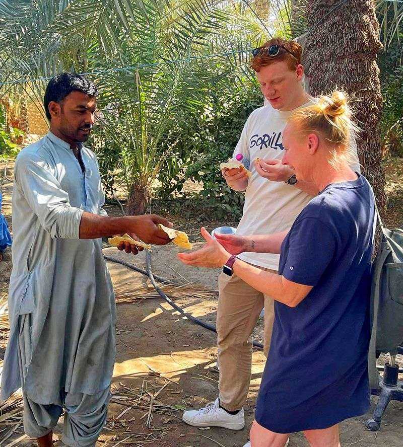 group of people standing-Al Ain Oasis Abu Dhabi