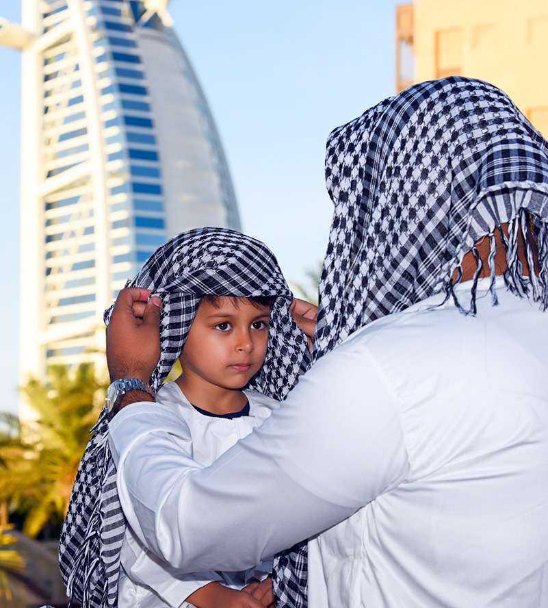 man and child enjoying a stroll together Dubai