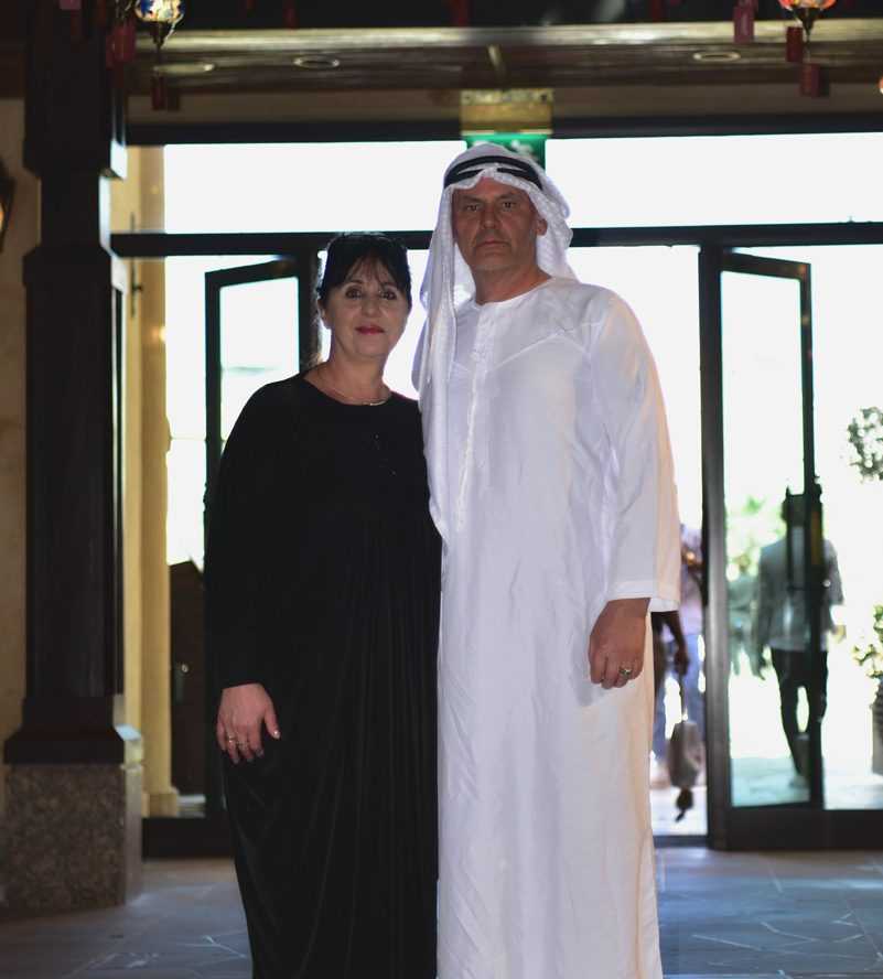 man and woman standing in front of a door-Dubai Sightseeing Tour